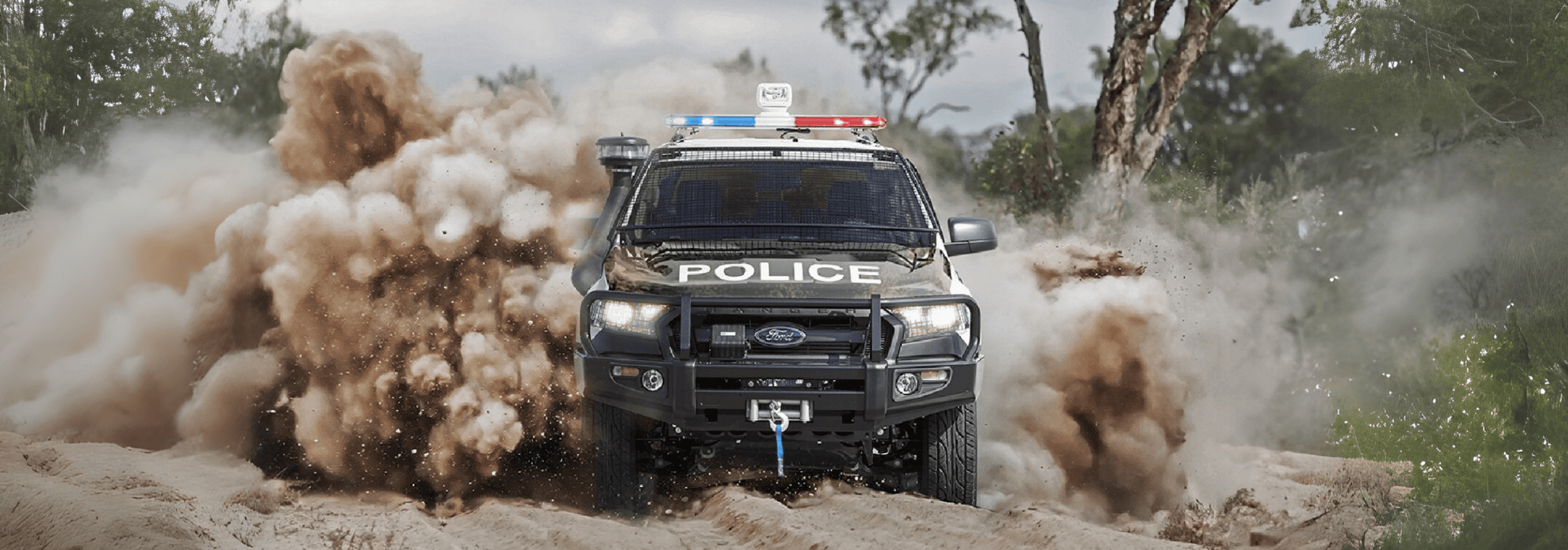 Ford Ranger Modified Police Truck on a dirt path.